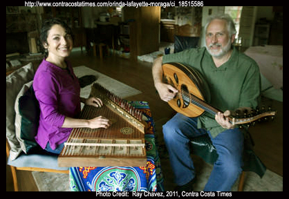 Yosifah (with qanun) and Nathan (with oud) practicing together at home.  Photo by Ray Chavez, staff photographer, Contra Costa Times.